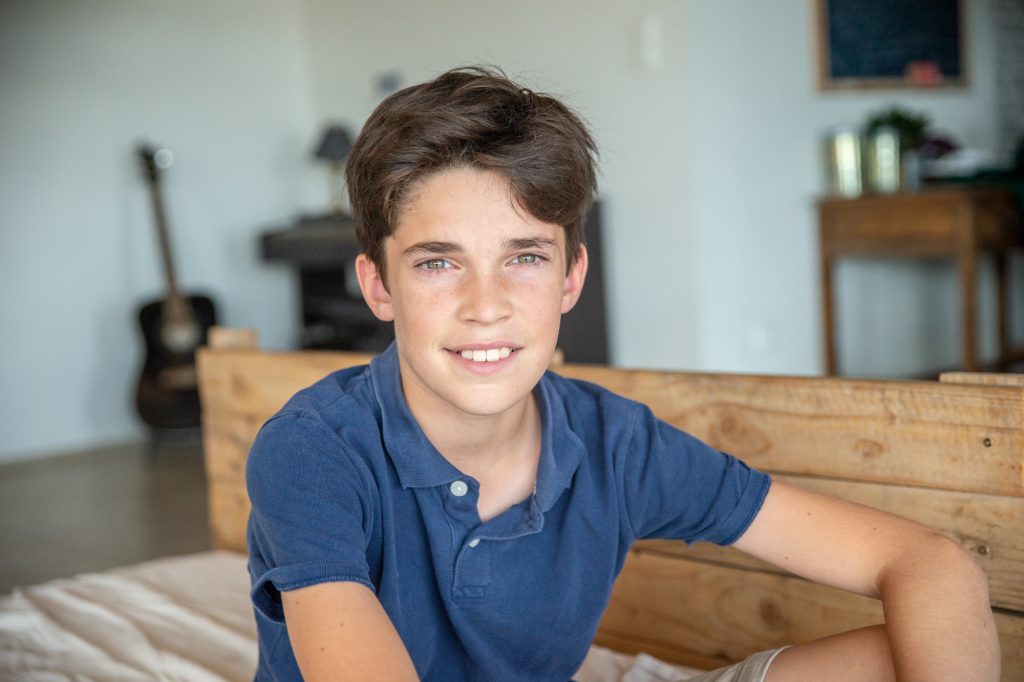 Portrait d'un jeune adolescent à son domicile . Photo Studio Polidori